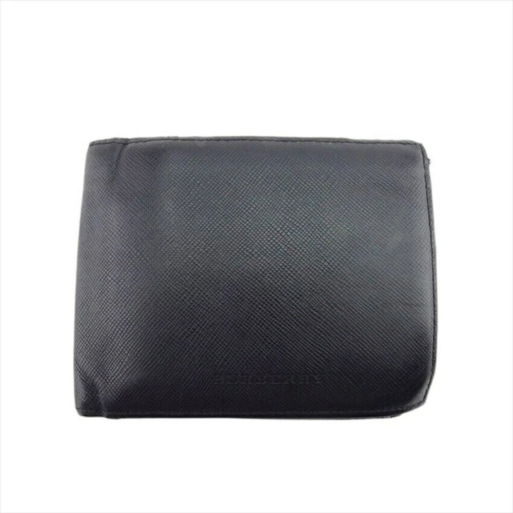 Burberry Bi -fold wallet embossed leather Authentic USED